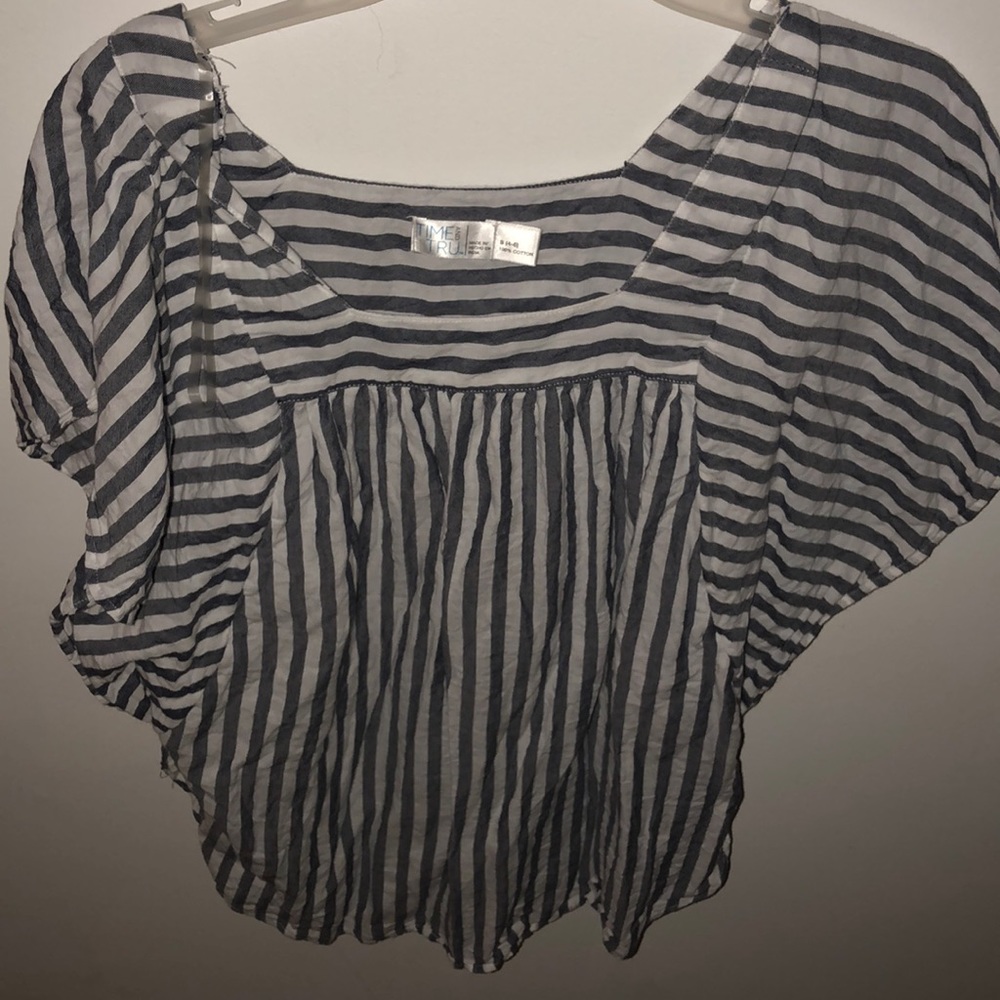 a blue and white striped blouse